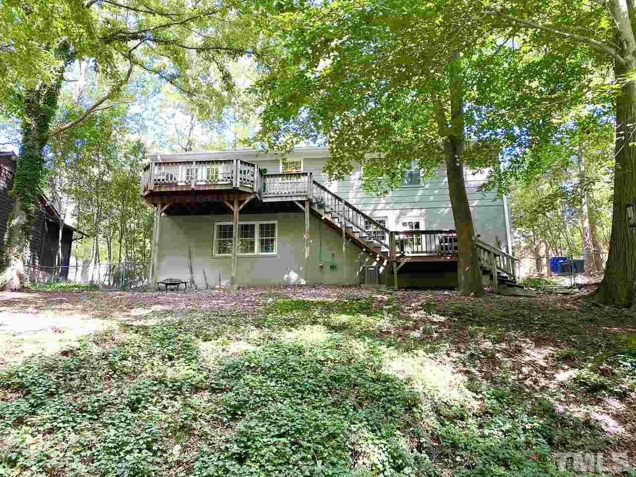 4917 Oak Park Road Raleigh, NC 27612 - Photo 23 of 25 a view of a house with a yard