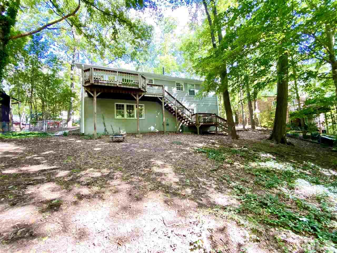 4917 Oak Park Road Raleigh, NC 27612 - Photo 24 of 25 a view of a house with a yard