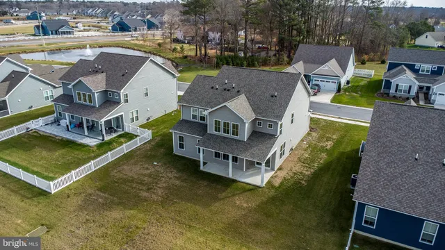 an aerial view of a house with a garden