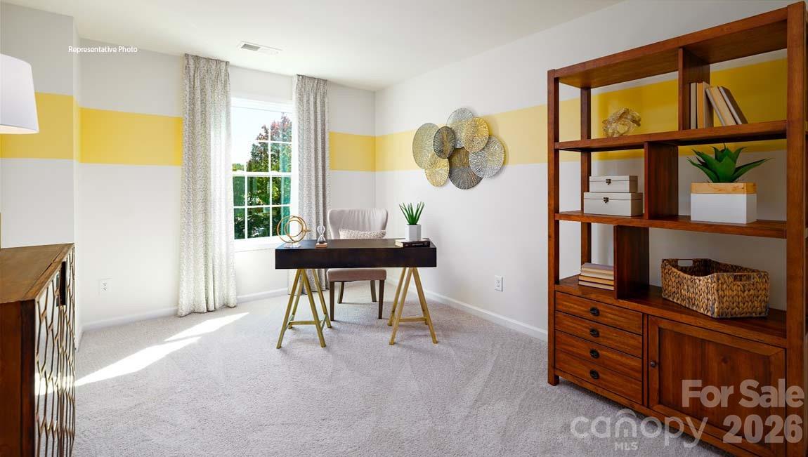 107 Rhuidean Court Troutman, NC 28166 - Photo 30 of 44 a workspace with furniture and window