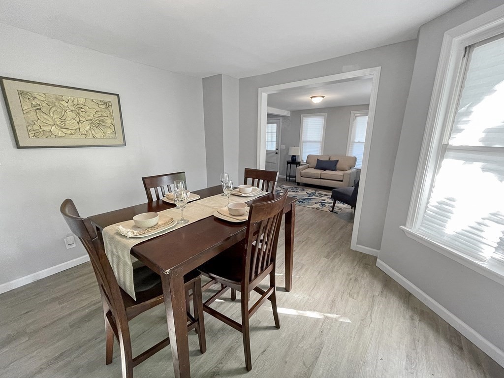 12 Ladd Street Springfield, MA 01109 - Photo 13 of 37 a view of a dining room with furniture and a window