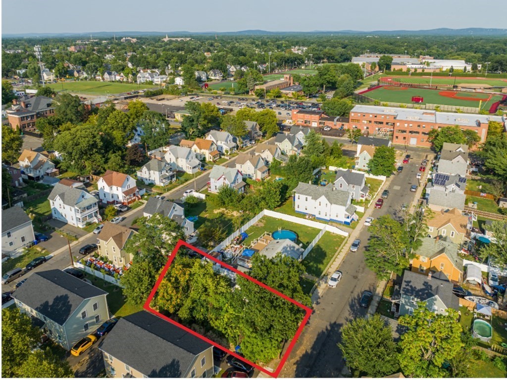 12 Ladd Street Springfield, MA 01109 - Photo 3 of 37 an aerial view of residential houses with outdoor space