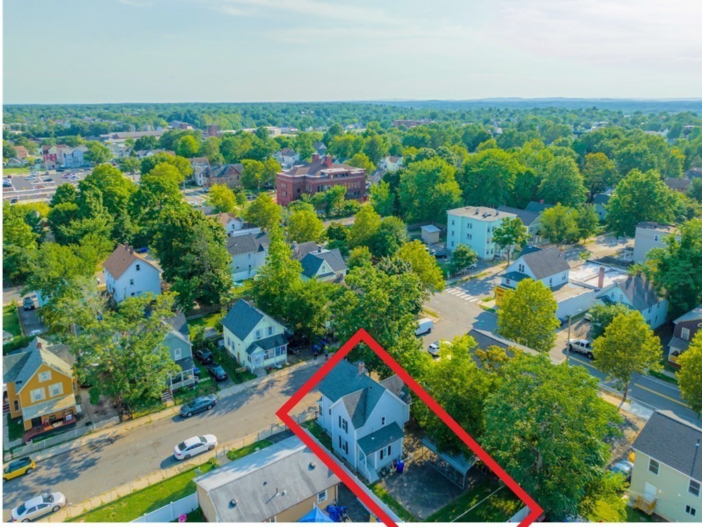 12 Ladd Street Springfield, MA 01109 - Photo 34 of 37 an aerial view of residential houses with outdoor space and trees