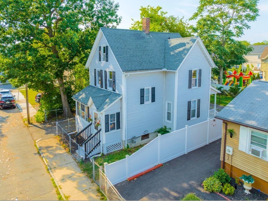12 Ladd Street Springfield, MA 01109 - Photo 5 of 37 a aerial view of a house with a yard