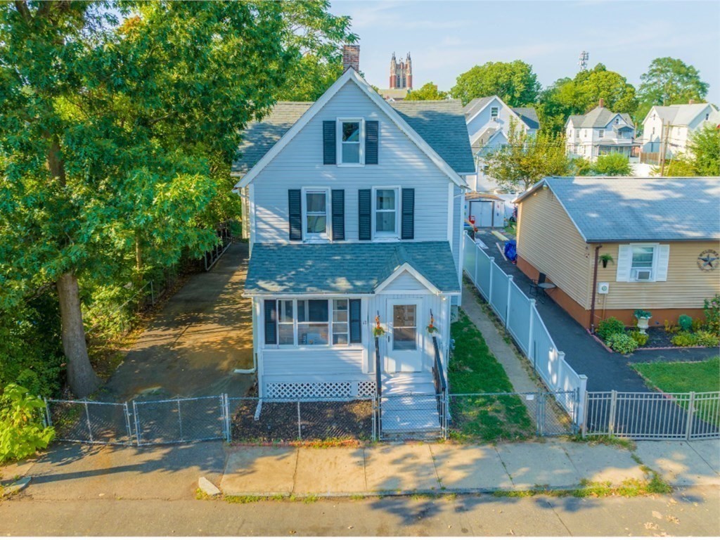 12 Ladd Street Springfield, MA 01109 - Photo 6 of 37 a front view of a house with garden