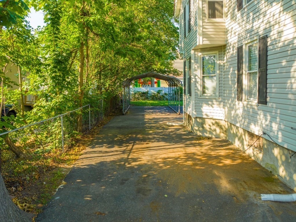 12 Ladd Street Springfield, MA 01109 - Photo 7 of 37 a view of a house with a yard