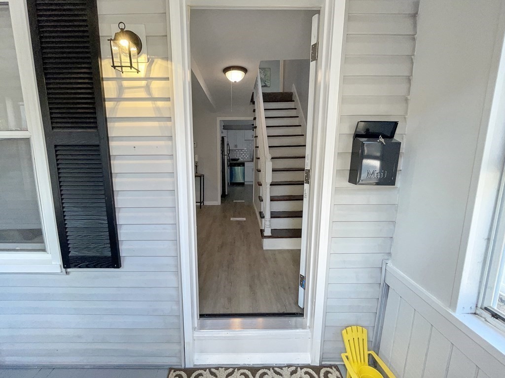 12 Ladd Street Springfield, MA 01109 - Photo 9 of 37 a view of staircase with wooden floor