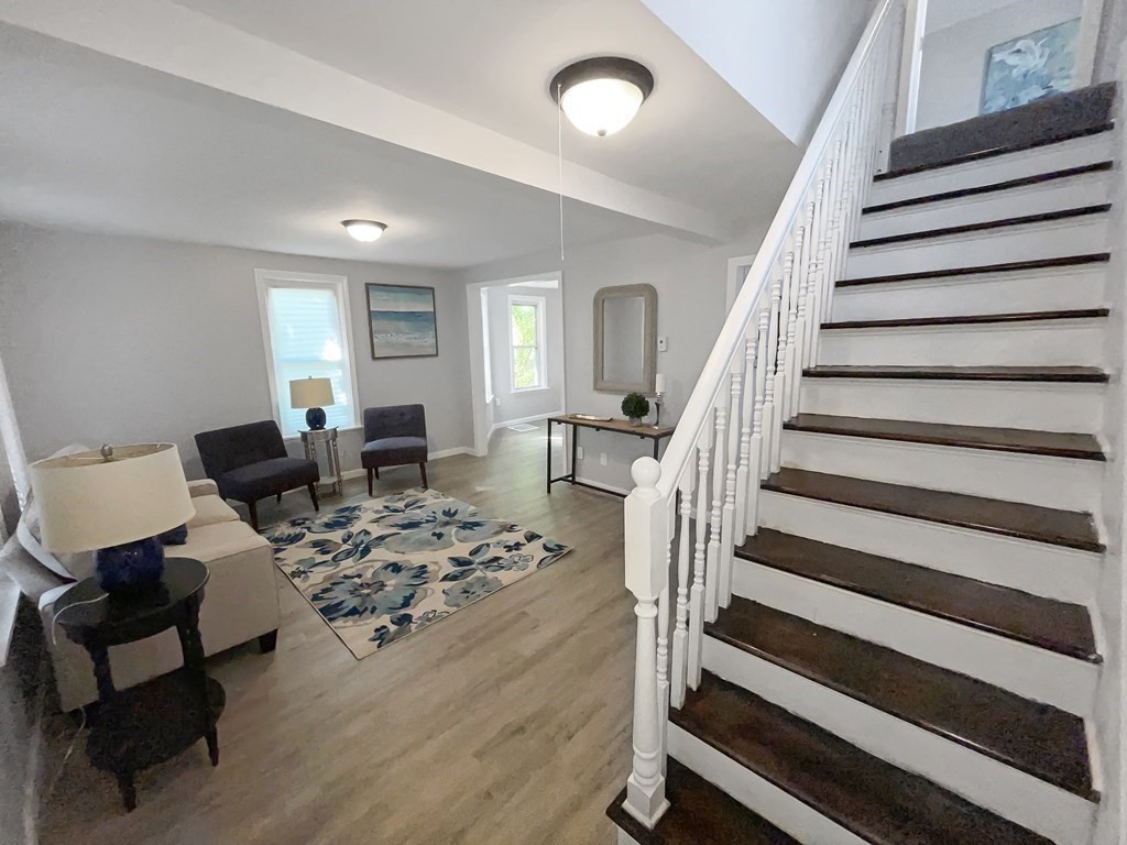 12 Ladd Street Springfield, MA 01109 - Photo 10 of 37 a living room with furniture and wooden floor