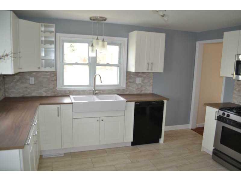 1152 Eckert Road Monaca, PA 15061 - Photo 8 of 16 Kitchen. Farm sink w/ beautiful tile back splash.