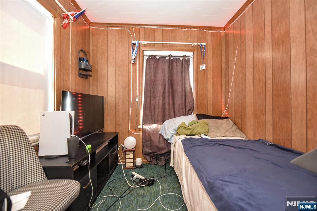142 South Main Street Hackensack, NJ 07601 - Photo 14 of 33 a bedroom with a bed and furniture