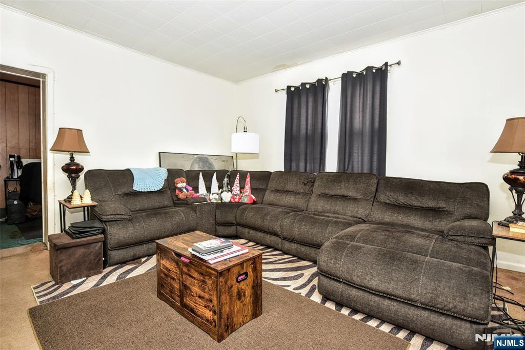 142 South Main Street Hackensack, NJ 07601 - Photo 3 of 33 a living room with furniture and a flat screen tv