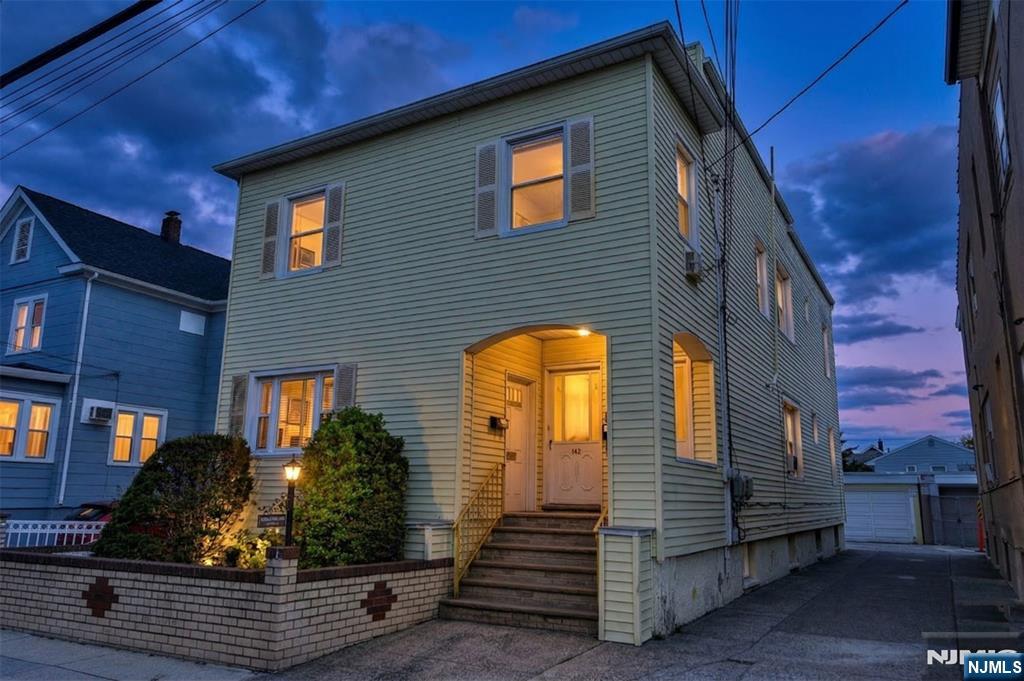 142 South Main Street Hackensack, NJ 07601 - Photo 33 of 33 a front view of a house with a yard