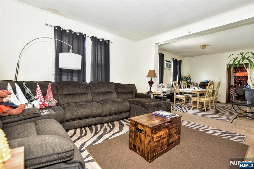142 South Main Street Hackensack, NJ 07601 - Photo 5 of 33 a living room with furniture and wooden floor