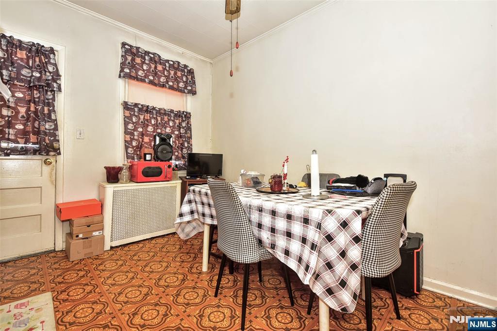 142 South Main Street Hackensack, NJ 07601 - Photo 9 of 33 a view of a dining room with furniture and wooden floor