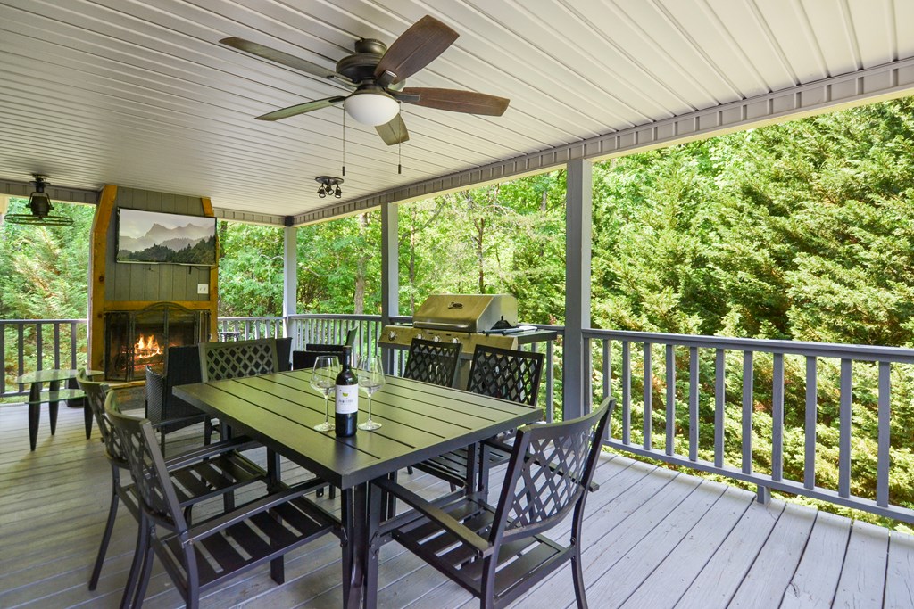 78 Bluebird Lane Blue Ridge, GA 30513 - Photo 11 of 29 a view of a dining room with furniture window and wooden floor