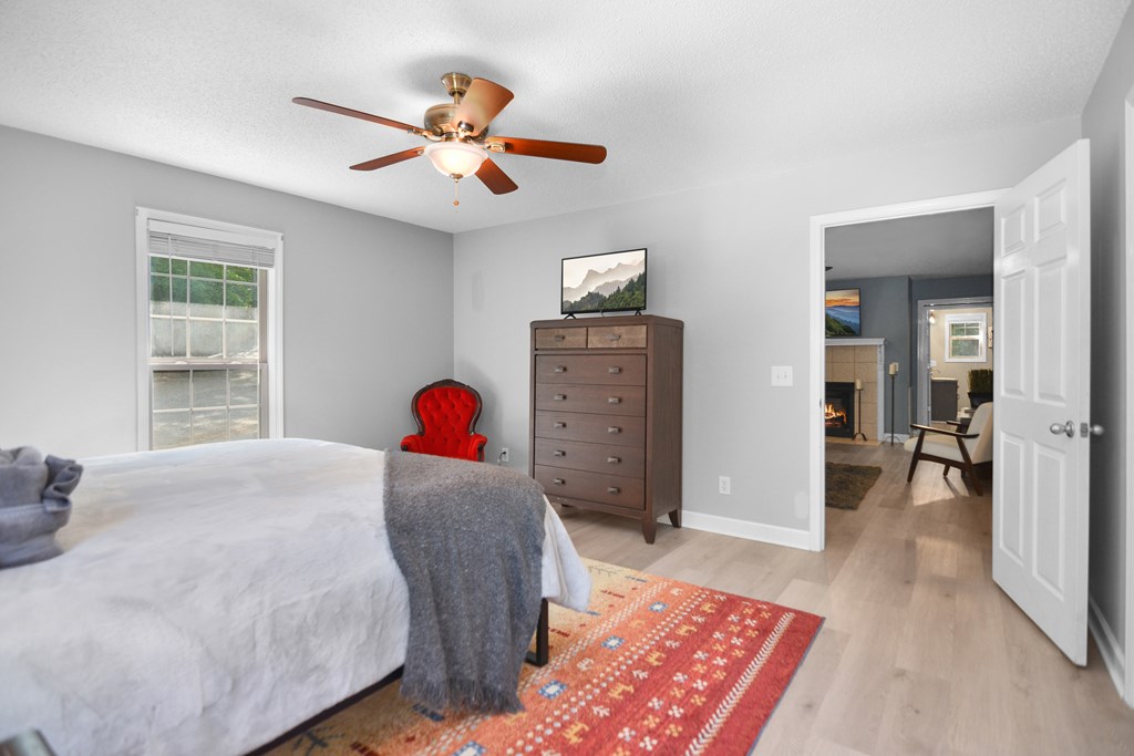 78 Bluebird Lane Blue Ridge, GA 30513 - Photo 13 of 29 a bedroom with a bed and a dresser