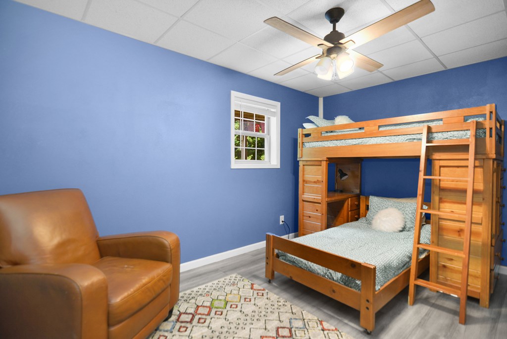 78 Bluebird Lane Blue Ridge, GA 30513 - Photo 21 of 29 a bedroom with a bed and a couch