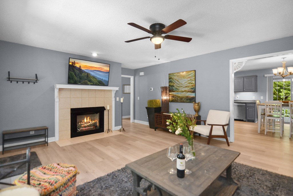 78 Bluebird Lane Blue Ridge, GA 30513 - Photo 5 of 29 a living room with furniture a fireplace and a table