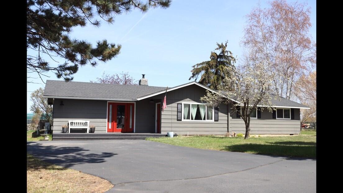 21566 Northeast Butler Market Road Bend, OR 97701 - Photo 1 of 1 a view of a house with a entertaining space
