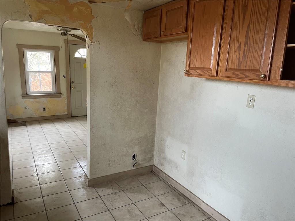 2851 Mt Troy Road Pittsburgh, PA 15212 - Photo 8 of 19 a view of a livingroom with an empty space and a window