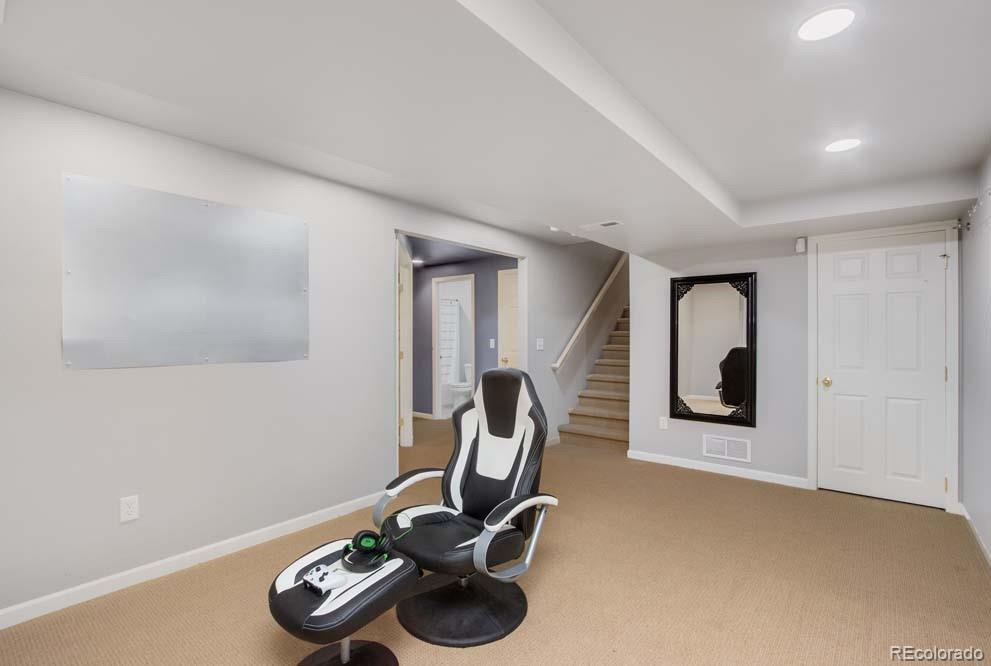 2031 Prairie View Court Fort Collins, CO 80526 - Photo 13 of 33 a view of a room with gym equipment