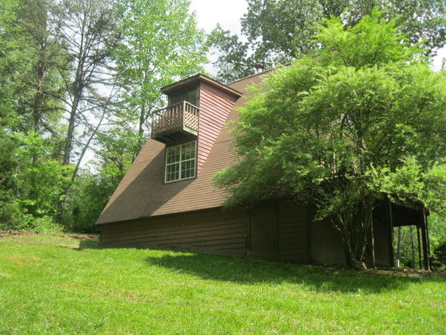 104 Meadowlark Road Blue Ridge, VA 24064 - Photo 7 of 19 a view of a house with a yard