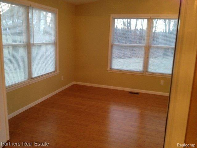 8227 Bergin Road Howell, MI 48843 - Photo 13 of 22 Sunroom 2