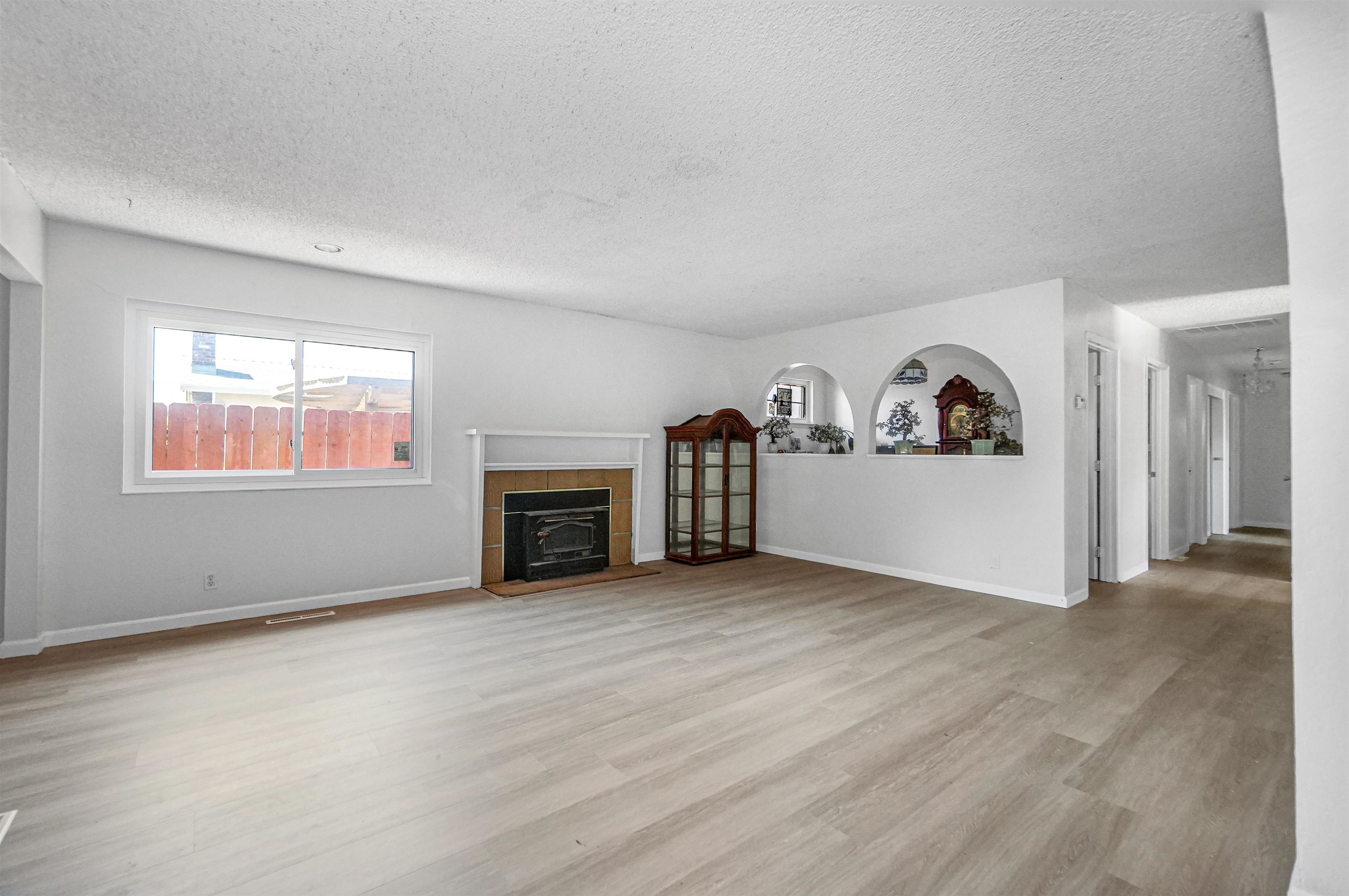 512 Teasdale Place Hayward, CA 94544 - Photo 14 of 58 a view of a livingroom with an empty space and a window