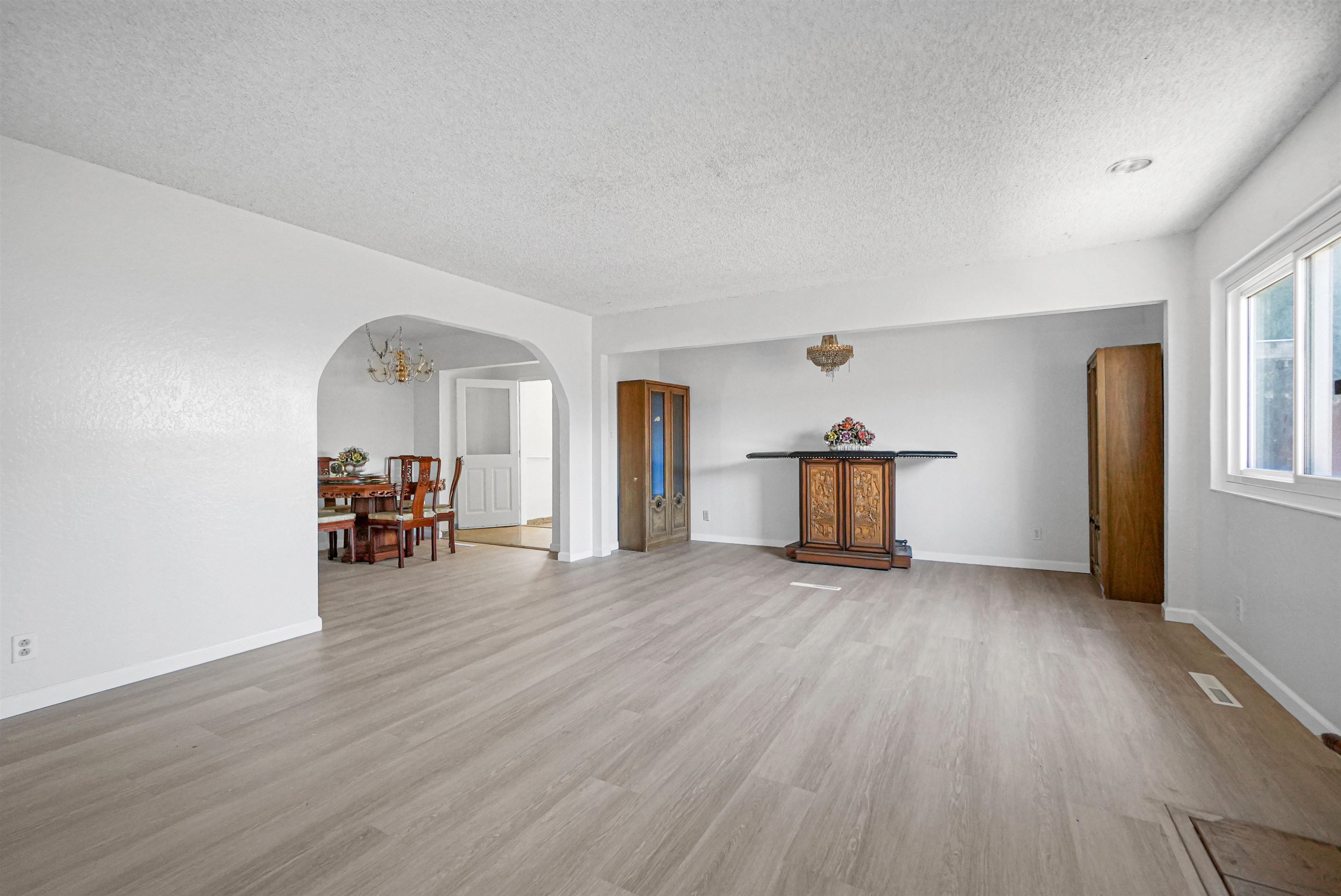 512 Teasdale Place Hayward, CA 94544 - Photo 16 of 58 a view of a livingroom with wooden floor and furniture