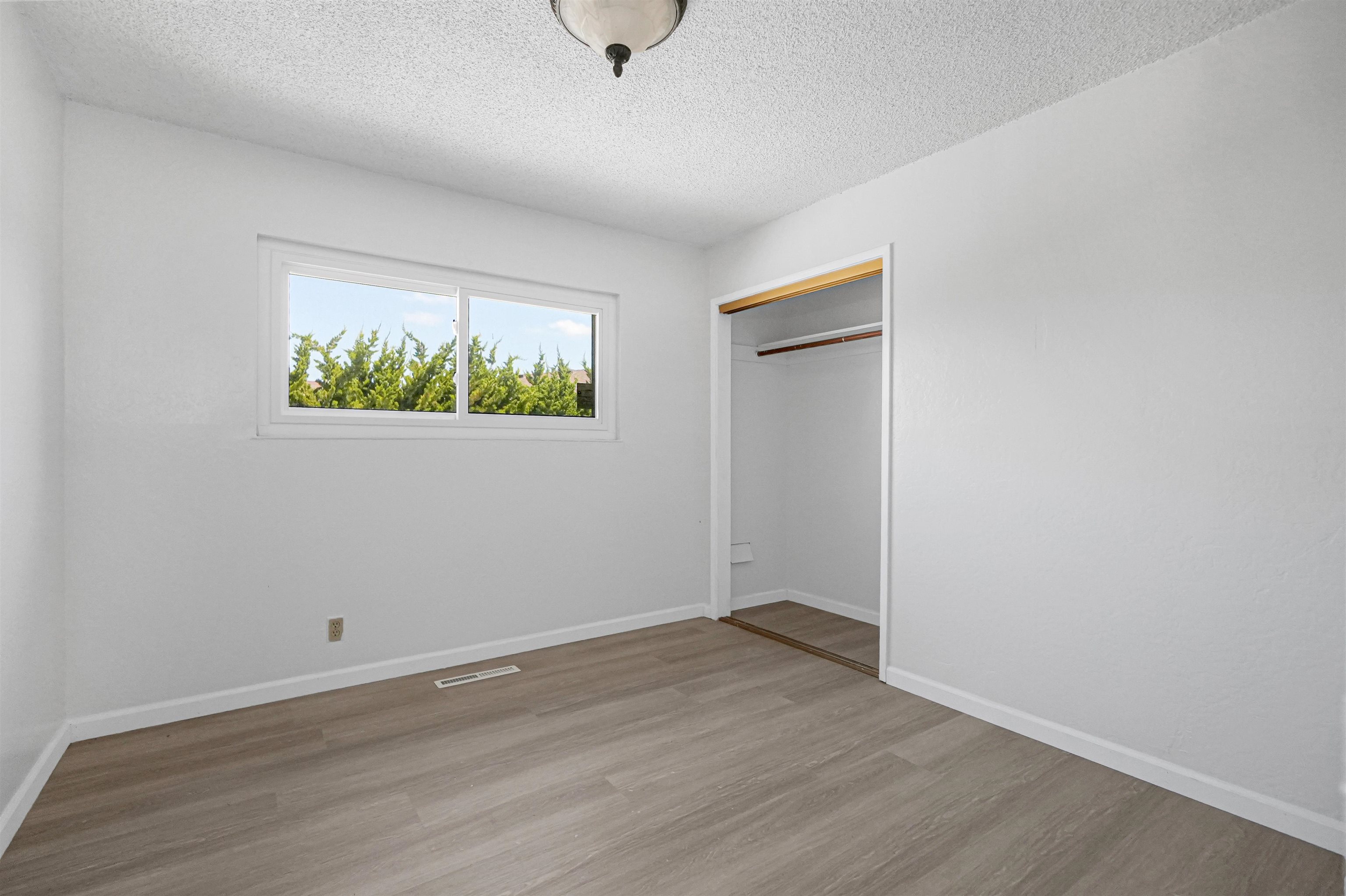 512 Teasdale Place Hayward, CA 94544 - Photo 21 of 58 a view of room with wooden floor