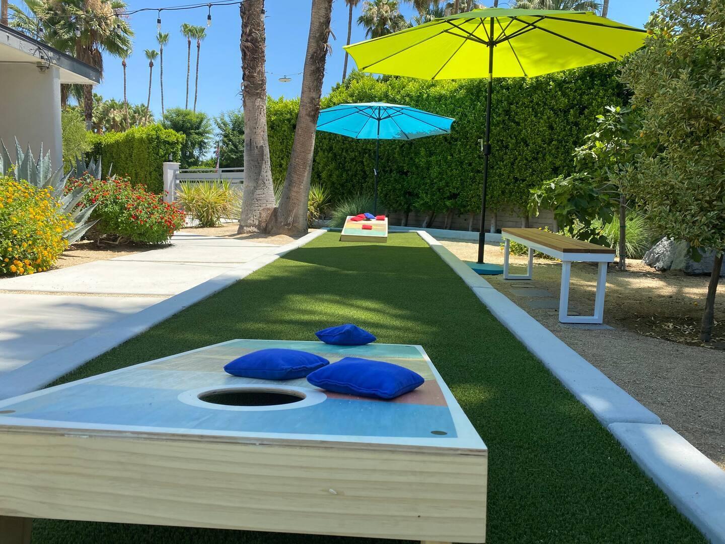 a view of a backyard with sitting area