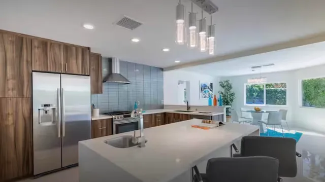 a view of a lake with a house in the background