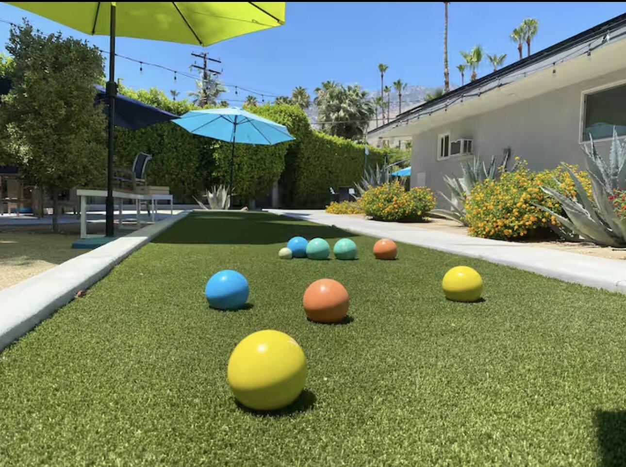 1375 South Calle Rolph Palm Springs, CA 92264 - Photo 15 of 19 a view of a house with a swimming pool and sitting area