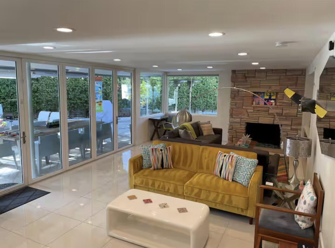 1375 South Calle Rolph Palm Springs, CA 92264 - Photo 17 of 19 a living room with furniture and a fireplace