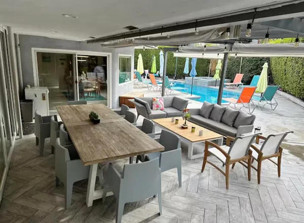 a view of a swimming pool with a patio