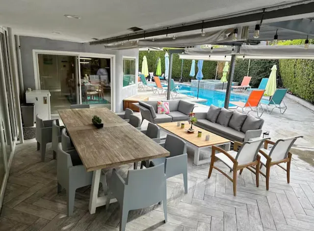 a view of a swimming pool with a patio