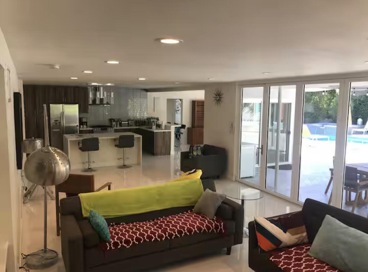 1375 South Calle Rolph Palm Springs, CA 92264 - Photo 7 of 19 a living room with furniture and a view of kitchen