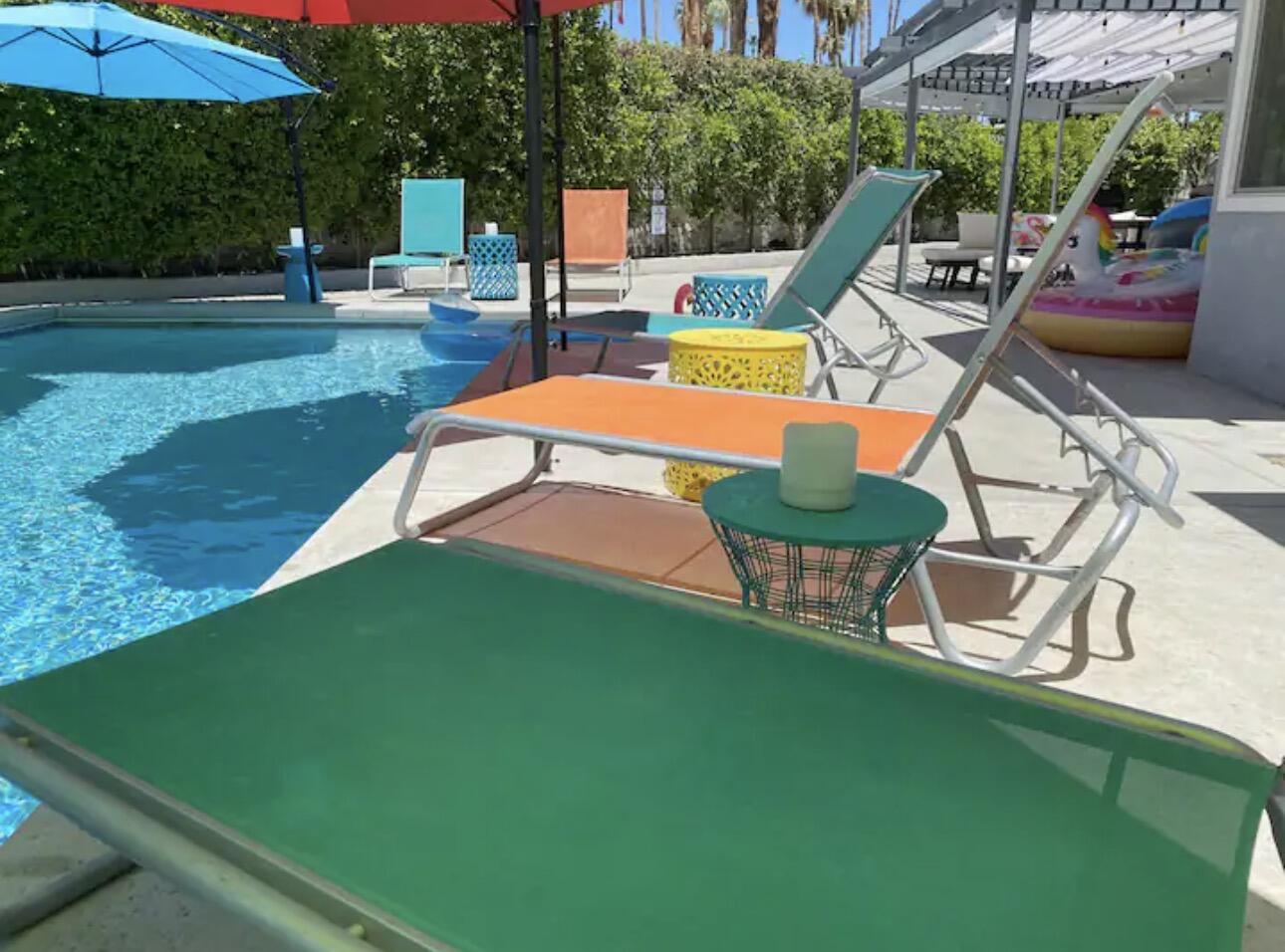 1375 South Calle Rolph Palm Springs, CA 92264 - Photo 9 of 19 a view of a swimming pool with a patio