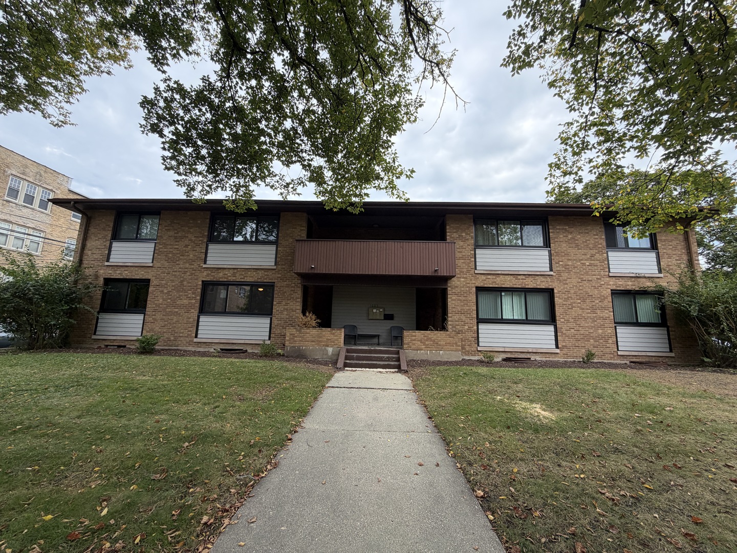 1605 Monroe Street, Unit 1 Evanston, IL 60202 - Photo 1 of 14 a front view of house with yard