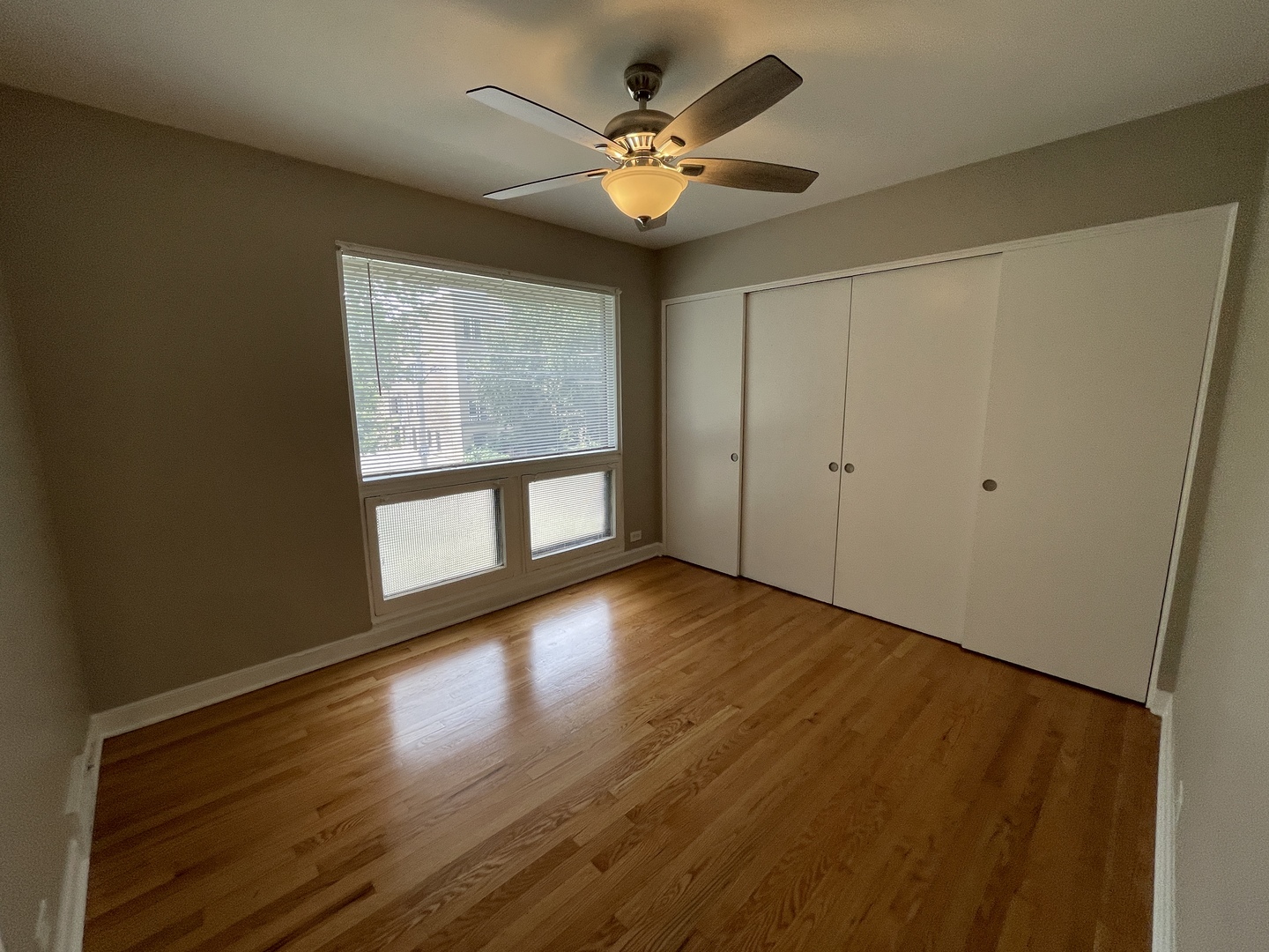 1605 Monroe Street, Unit 1 Evanston, IL 60202 - Photo 11 of 14 a view of an empty room with a window