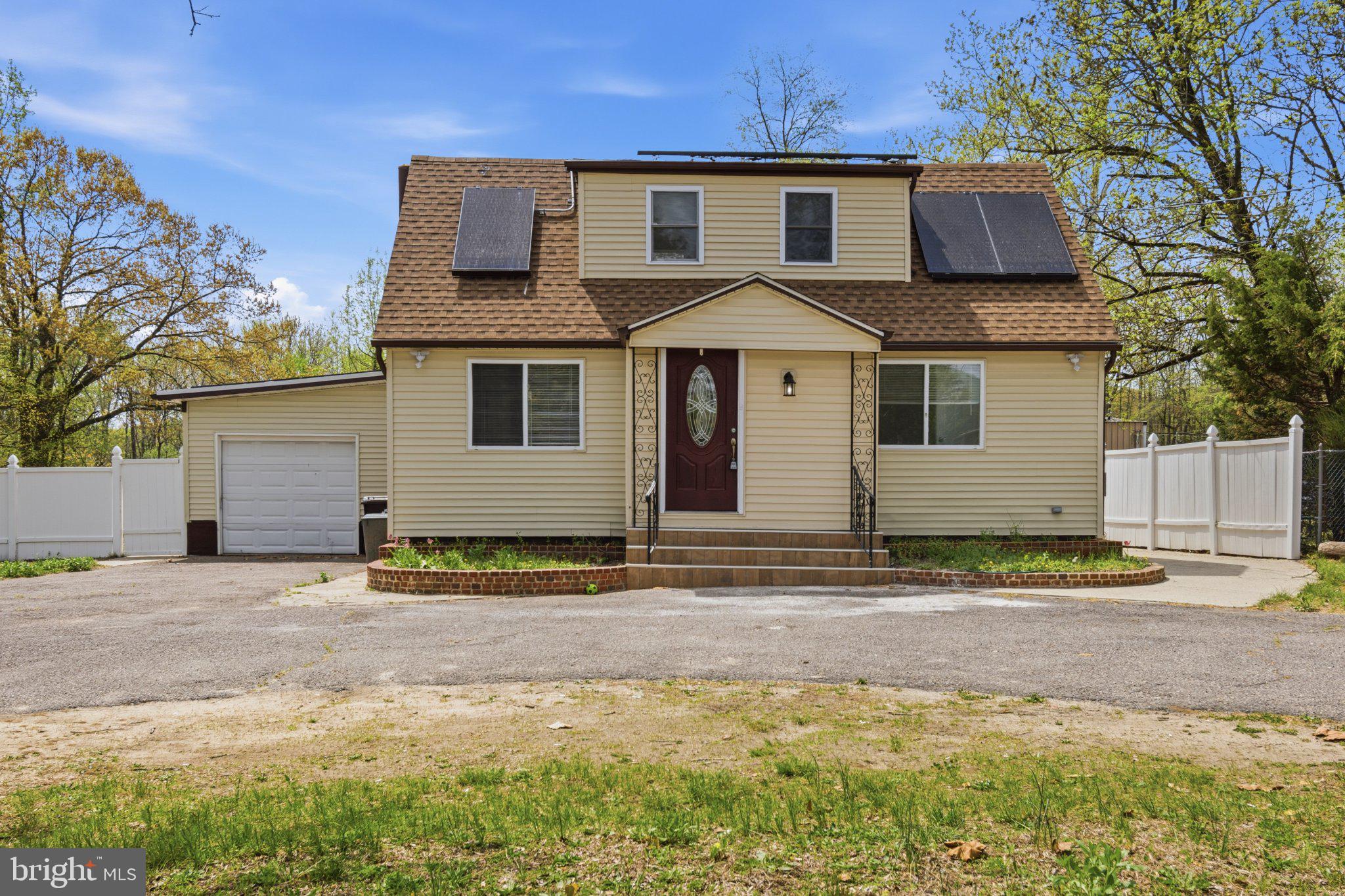 Charming home with modern solar panels.