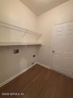 an empty room with a wooden floor