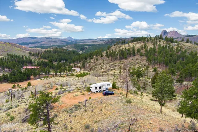 a view of swimming pool with a yard