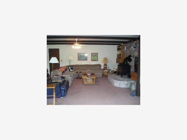 200 Old Smith Road Watsonville, CA 95076 - Photo 3 of 8 a living room with furniture and a potted plant