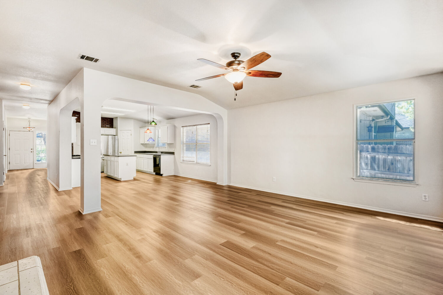 1205 Machado Road Cedar Park, TX 78613 - Photo 13 of 30 a view of empty room with wooden floor and fan
