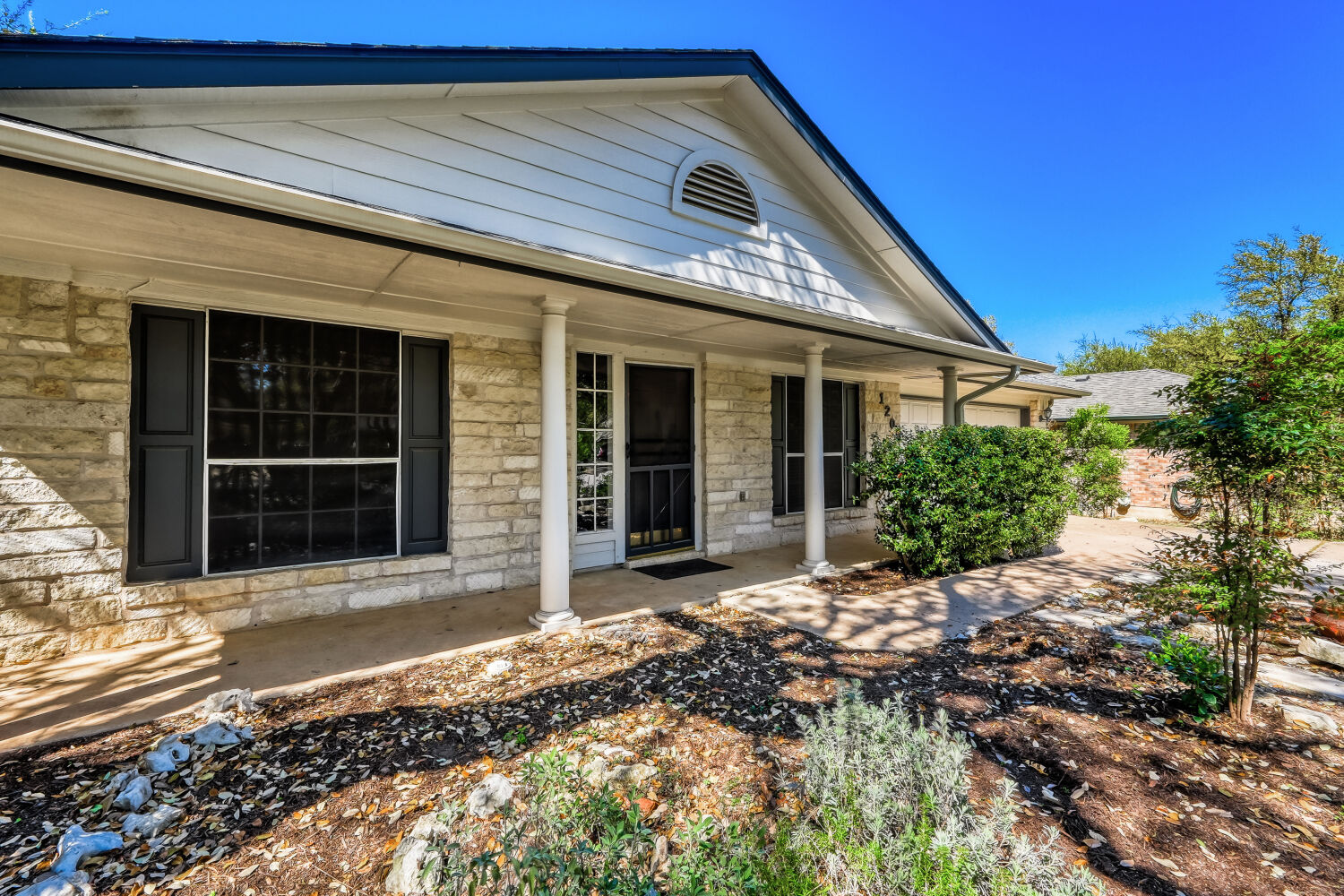 1205 Machado Road Cedar Park, TX 78613 - Photo 2 of 30 a front view of a house with a garden