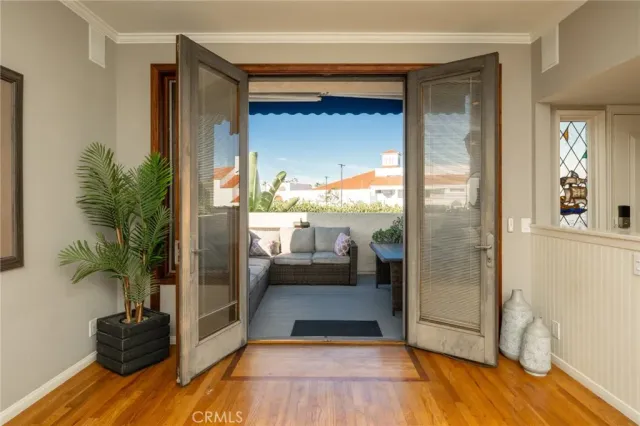 a view of a entryway door with living room