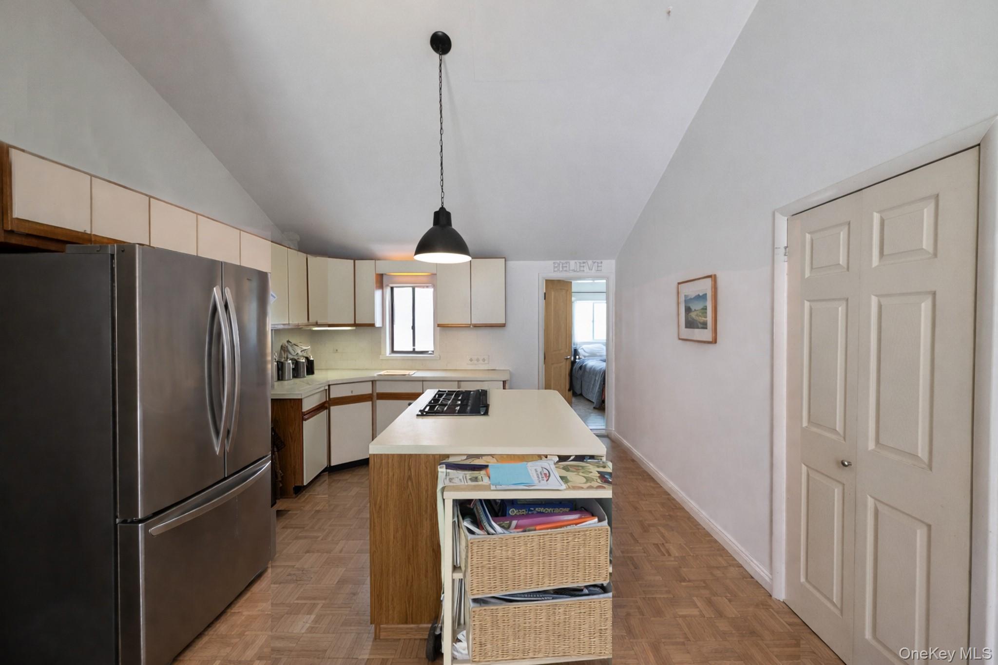 17 Oneida Avenue Selden, NY 11784 - Photo 5 of 12 a kitchen with sink refrigerator and window