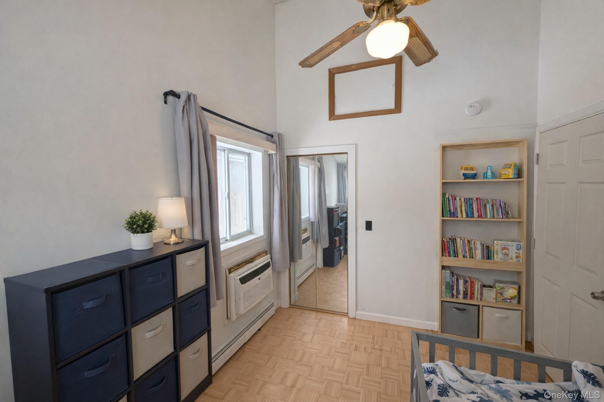 17 Oneida Avenue Selden, NY 11784 - Photo 9 of 12 a kitchen with stainless steel appliances a refrigerator and a chandelier