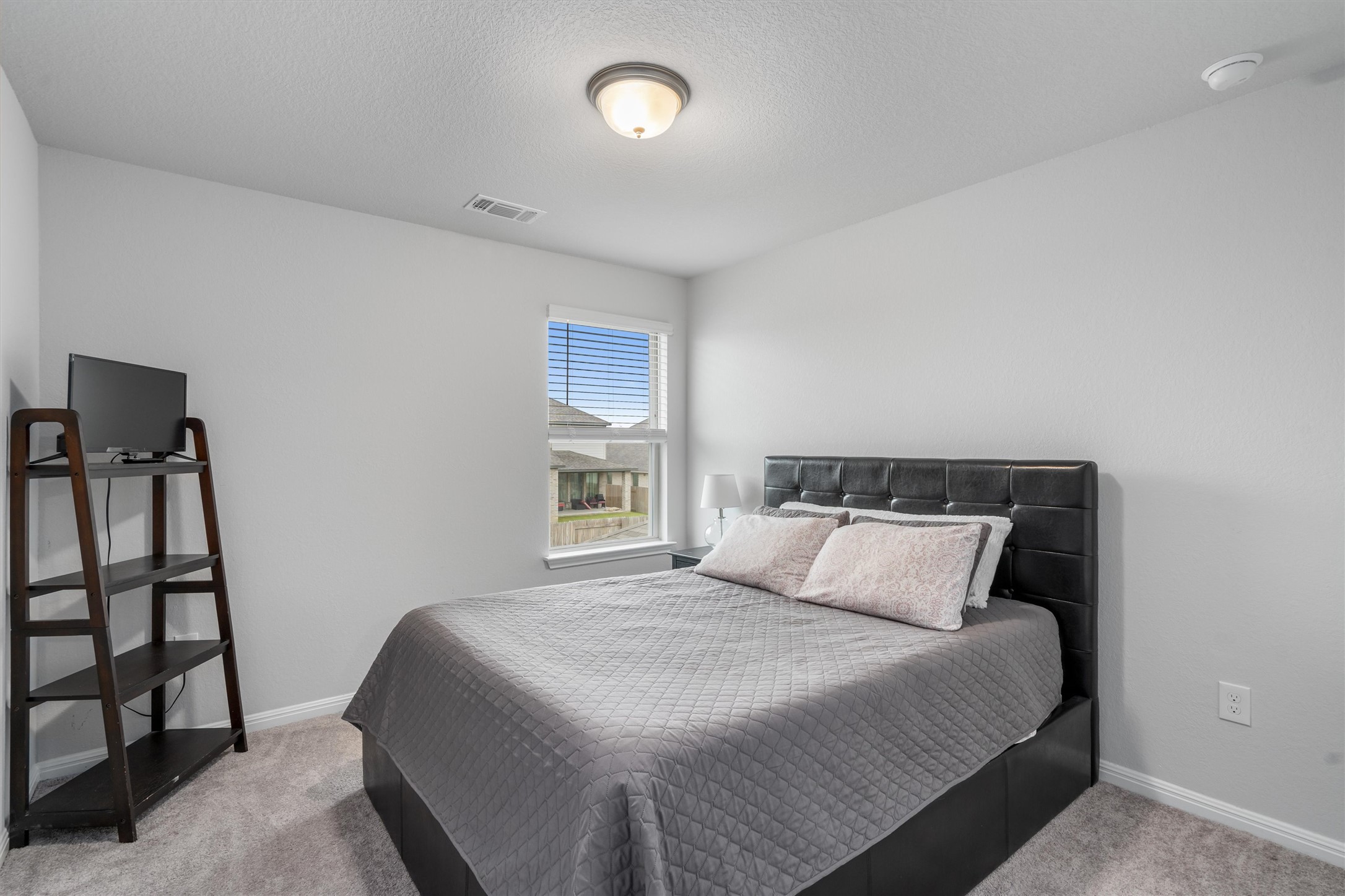224 Backstays Loop Kyle, TX 78640 - Photo 13 of 19 Carpeted room with a single window featuring horizontal blinds